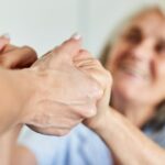 Hands of a Senior Citizen Hold for Support and Comfort