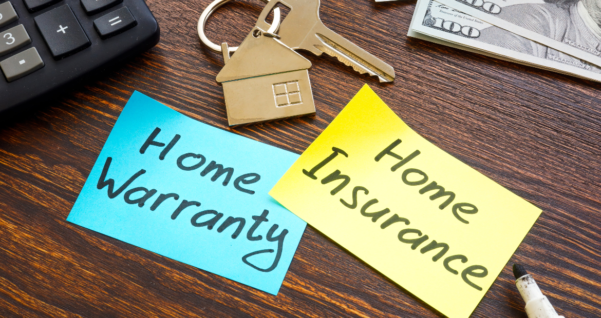 home insurance and key on the desk.